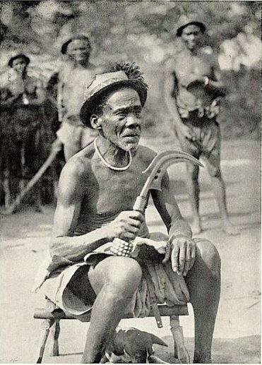 A prince's deputy at the court of Rikita. He holds a deputy's knife of office. Photo credit: Clarendon Press
